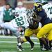 Michigan sophomore defensive tackle Quinton Washington tackles Eastern Michigan running back Ryan Brumfield during the fourth quarter at Michigan Stadium on Saturday. Melanie Maxwell I AnnArbor.com